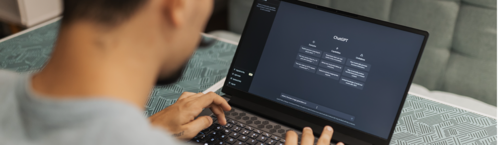 Man using ChatGPT on a laptop